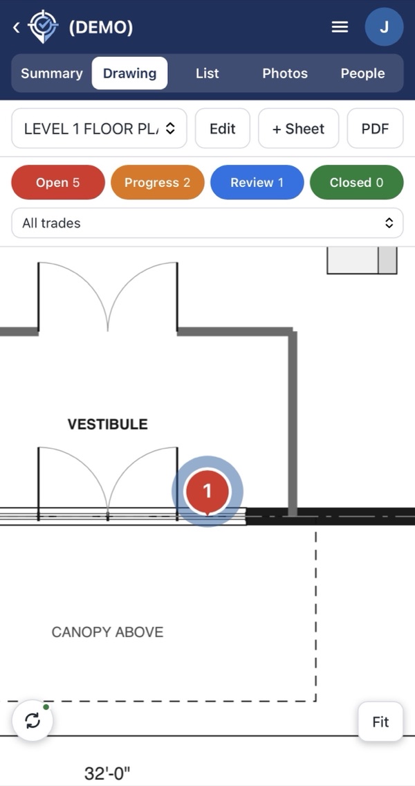 A numbered pin dropped on a zoomed-in floor plan on a phone.